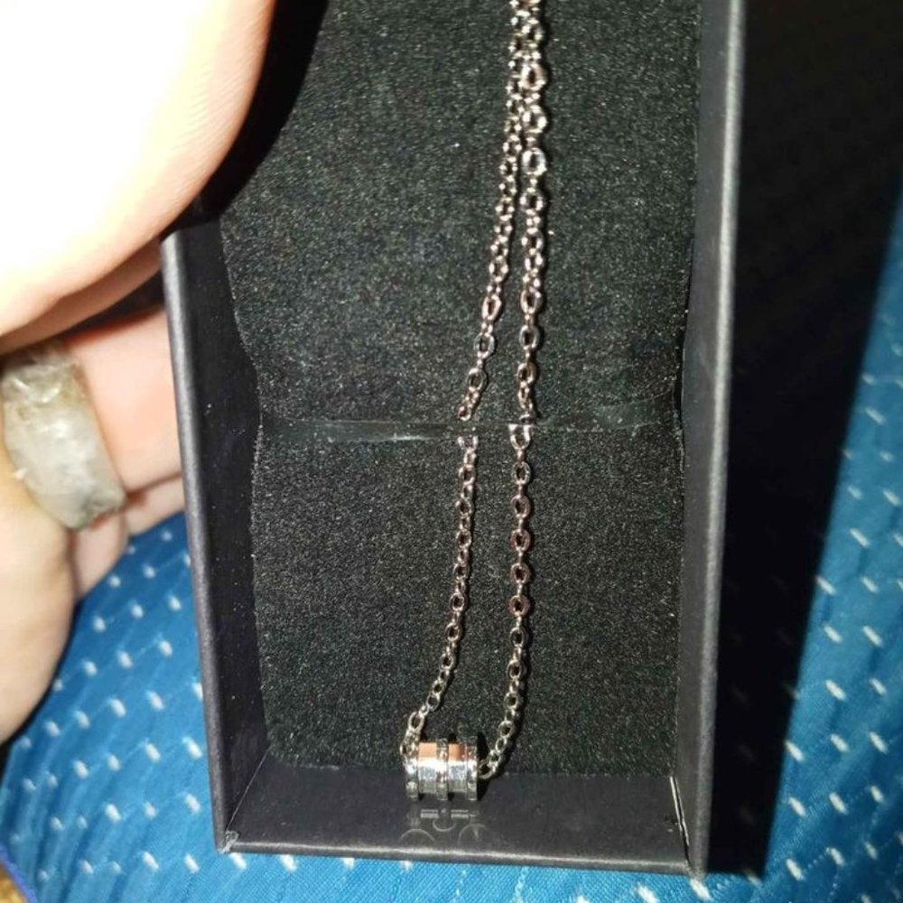 sterling silver chain w/silver pendant w/diamonds